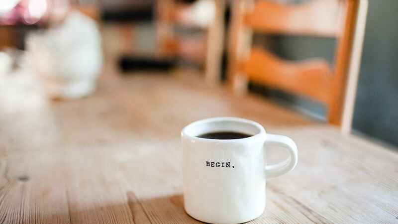 Coffee Cup With Text: Begin.