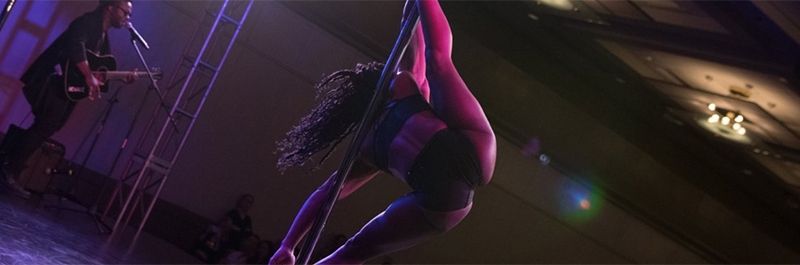 Pole Dancer Performs With Live Music.