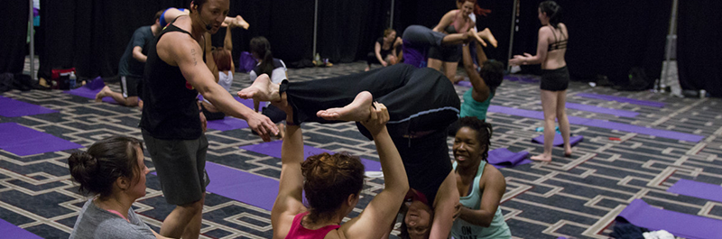 Spotters During An Acro Yoga Workshop.
