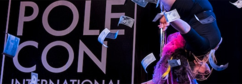 Pole Dancer Performs On Stage While Money Flies.