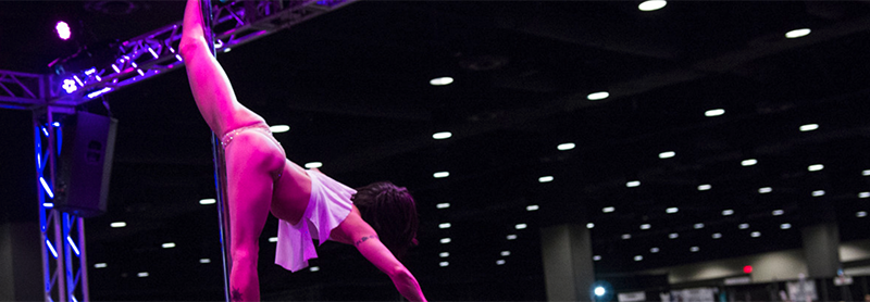 Pole Dancer Does Splits On Stage.