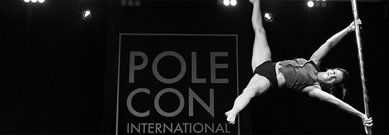 Pole Dancer Performing An Iron X.