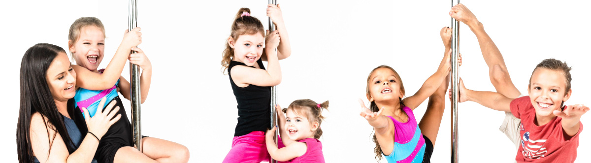 Smiling children climbing poles and waving.