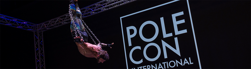 Eddie Danger performs aerial chains at PoleCon 2024