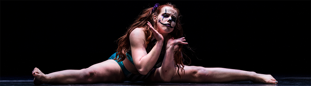 Acro Kat performs in the PoleCon 2024 Creepy showcase as a scary clown.