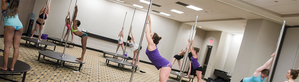 Pole Class, students doing a warm up.